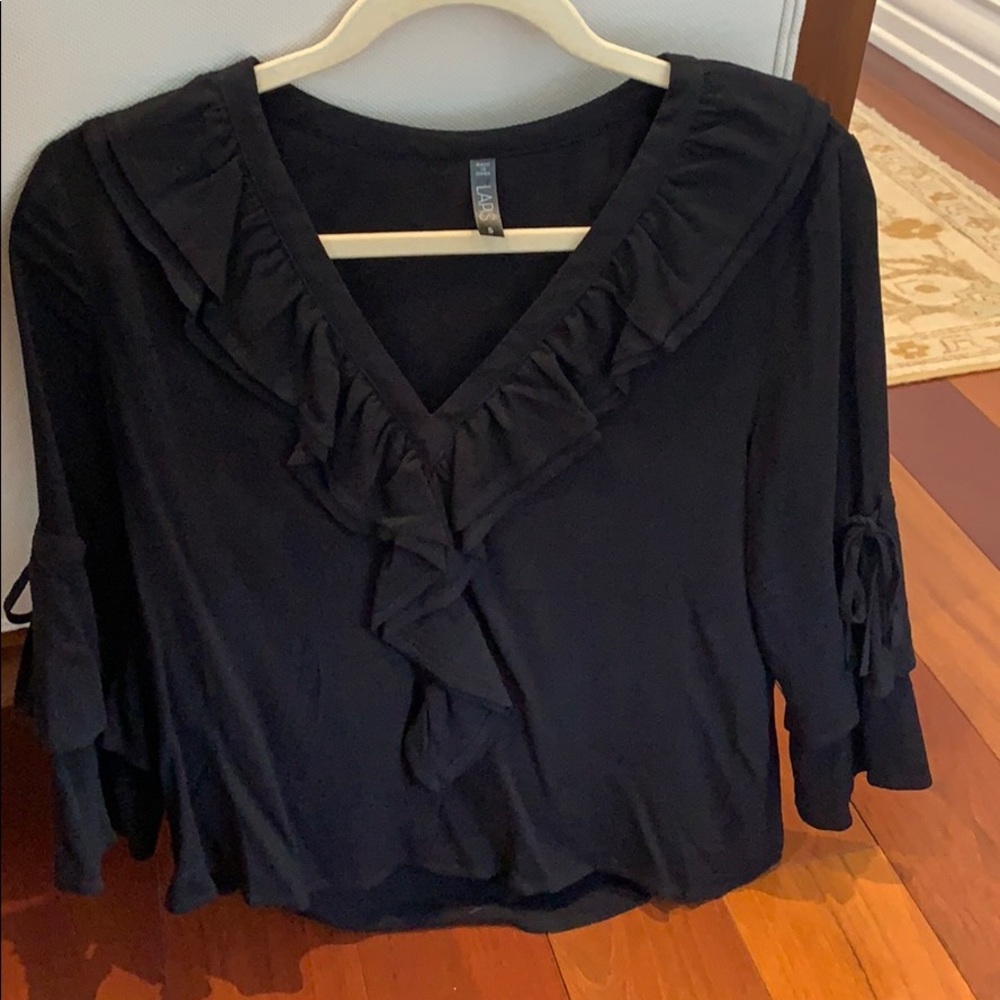 Black ruffled shirt
